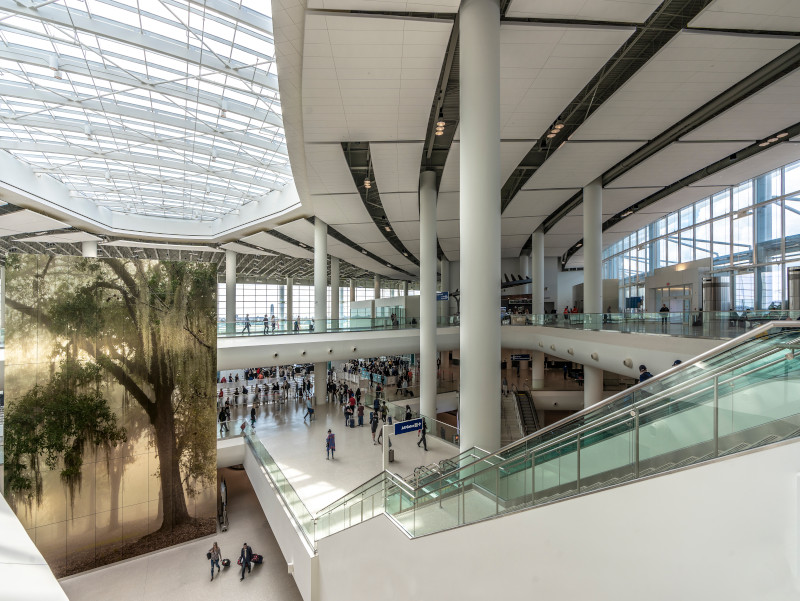 Image of interior of new terminal at Louis Armstrong New Orleans International Airport. Photo by J. Stephen Young. Photo used courtesy of New Orleans Convention and Visitors Bureau.