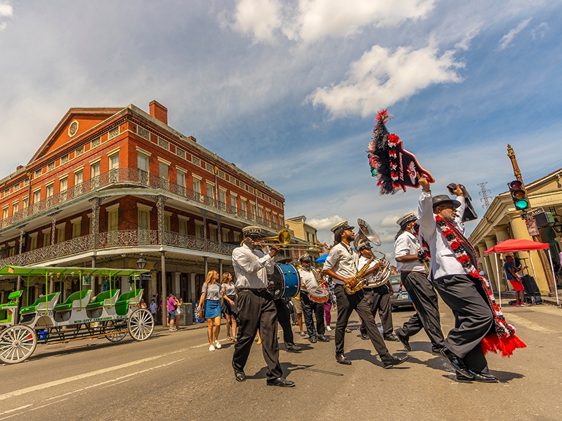 Image of second line parade, New Orleans. Photo courtesy of the New Orleans Convention and Visitors Bureau.
