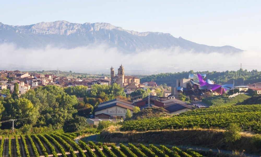 Rioja Alavesa Wine Route is one of many wine routes in Spain. It is home to several renowned vineyards and hotels, including the Wine City Complex by Frank Gehry for Marques de Riscal shown here. Photo by Daniel Tomlinson/Canva